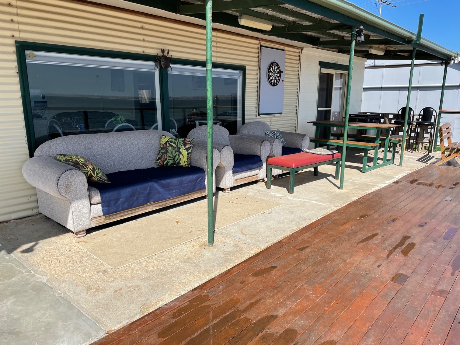 Outdoor seating deck area Black Point beachfront